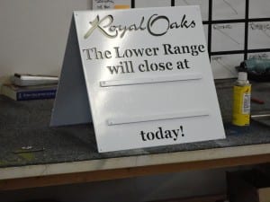 Royal Oaks Driving Range time sign