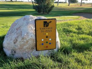 Rockwind Yardage Sign on Boulder