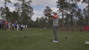 Tiger Woods with RHI Tee Markers